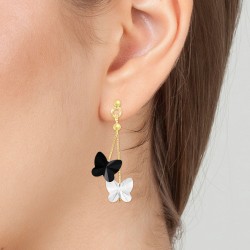 Butterfly earrings adorned...